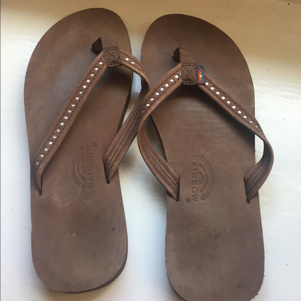 Rainbow flip flops.